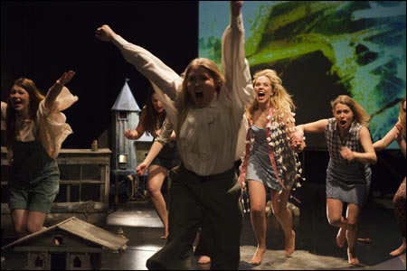 THE AMERICAN GIRL at Takomo Theatre. Girls come to terms with their smalltown origin, which on stage is a miniature set. Actresses from left Niina Koponen, Karoliina Niskanen, Essi Hellén (front), Iida-Maria Heinonen and Emmi Parviainen. Photo Courtesy: Heta Saukkonen